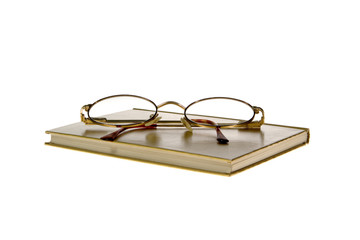 hardcover book and glasses on White Background