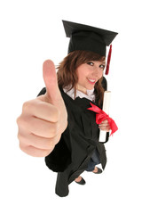 Female graduate showing a thumb up sign