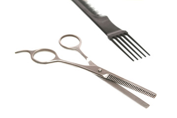 One scissors for a hairstyle on a white background