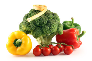Broccoli, pepper and tomatoes on a white background