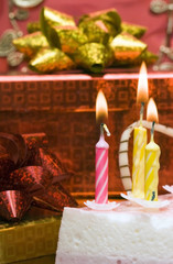 Fototapeta na wymiar cake and candles on celebratory table