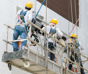 Three Painters Working on A Gondola
