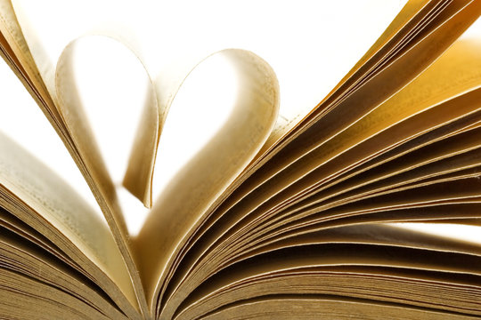 Pages of a book folded in to a heart shape