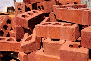 A stack of bricks at a construction site.