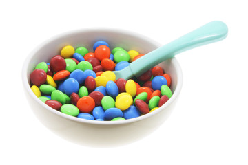 Chocolate Beans in Bowl with Plastic Spoon