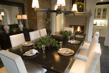Dining room and table with festive decor.