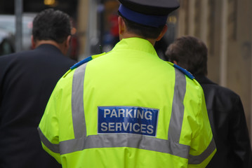 Patrolling traffic warden - 6865489