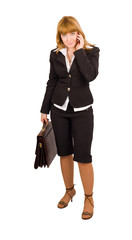 businesswoman talking on the phone and with a briefcase