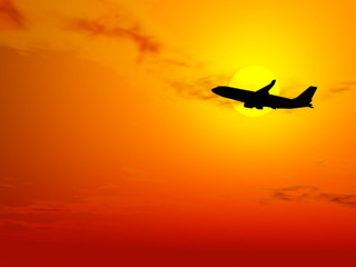 PLANE AT SUNSET