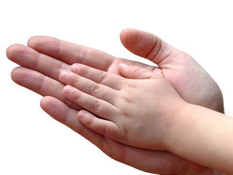 child and parent hands together