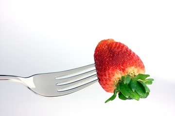 strawberry on a fork