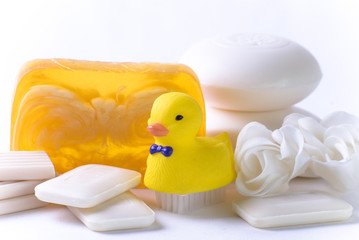 Soap and duckling on white.