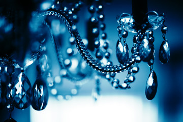Chrystal chandelier close-up, Shallow DOF. Abstract background.