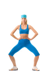 Fototapeta premium Beautiful young woman doing fitness exercise isolated on white b