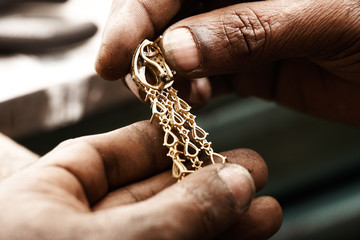 Goldsmith and earring.