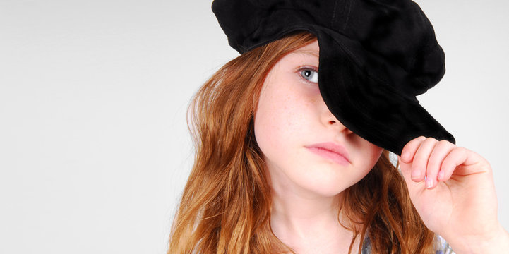 Cute Girl in Black Cap