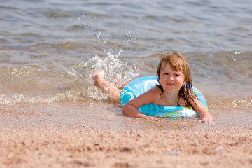 Fototapeta premium Kid in warm sea