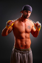 Attractive male  against black background