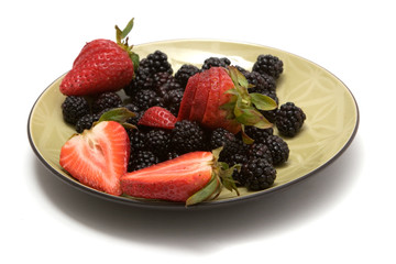 Fresh organic strawberries and blackberries