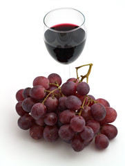 wineglass with a grape bunch