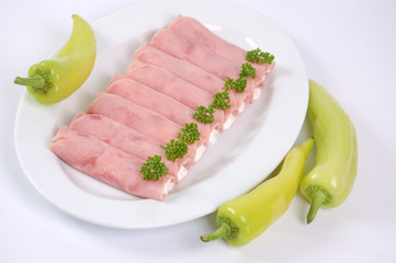 Rolled ham filled by cream with horseradish