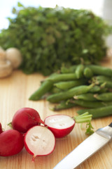 Fresh vegetables on cutting board.Fresh vegetables on board