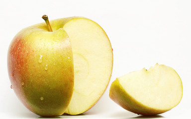 Green and red apple slice on white background