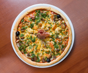 Tasty Italian pizza with ham