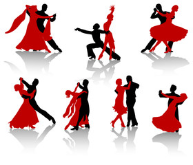 Silhouettes of the pairs dancing ballroom dances. 