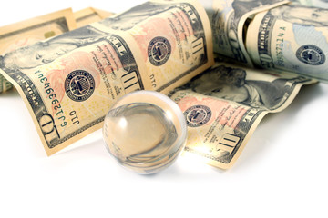 Sphere and dollars on a white background