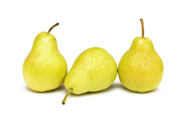 Three yellow pears isolated on the white