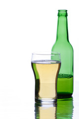 Beer glass and bottle on a white background