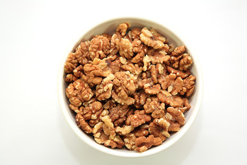 A bowl full of walnuts