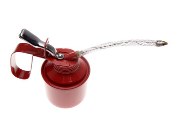 Red oil can isolated over white