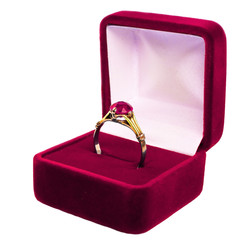 wedding ring in box over white