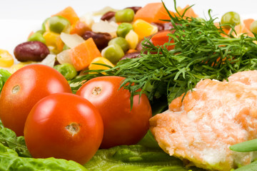 Stake from a salmon with vegetables