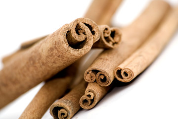 cinnamon sticks on white