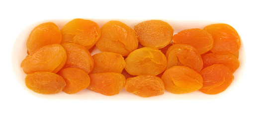 Apricots dried in white background isolated