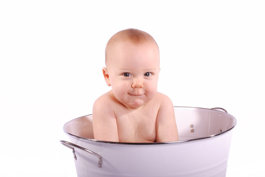 Shy Baby Boy in White Tub