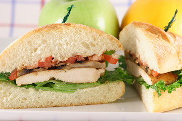 halved chicken breast sandwich