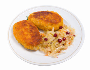 Cutlets in a plate with vegetables