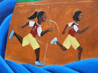 Neighborhood Mural of Female Children Playing Basketball