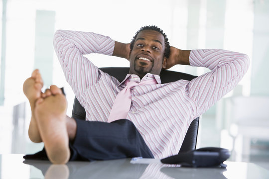 Businessman relaxing at desk