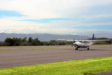 Small airplane in mountains
