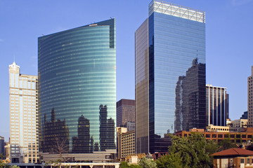 Fototapeta na wymiar Downtown buildings reflected