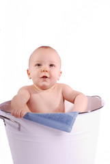 Sweet Baby in White Tub with Blue Washcloth