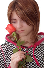 Sorrowful girl with rose