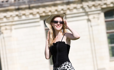Young happy woman in hat