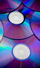 background of some colorful compact discs