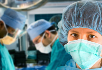 female surgeon with surgical team